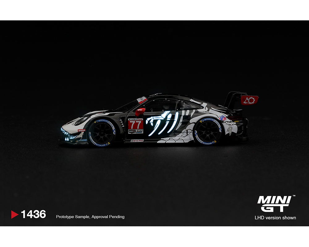 [PRE-ORDER] Estimated arrival April 2027| Mini GT 1:64 Porsche 911 GT3 R (992) #77 AO Racing “Skeleton Rexy” 2026 IMSA Petit Le Mans – (Glow in the Dark) – Limited Edition