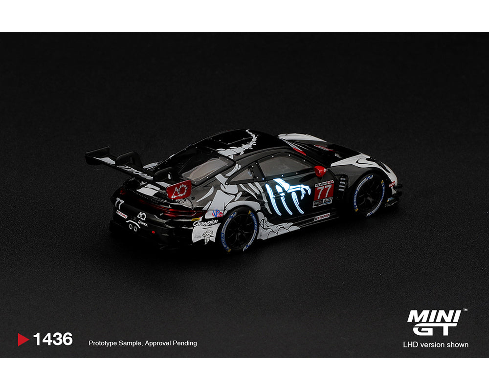 [PRE-ORDER] Estimated arrival April 2027| Mini GT 1:64 Porsche 911 GT3 R (992) #77 AO Racing “Skeleton Rexy” 2026 IMSA Petit Le Mans – (Glow in the Dark) – Limited Edition